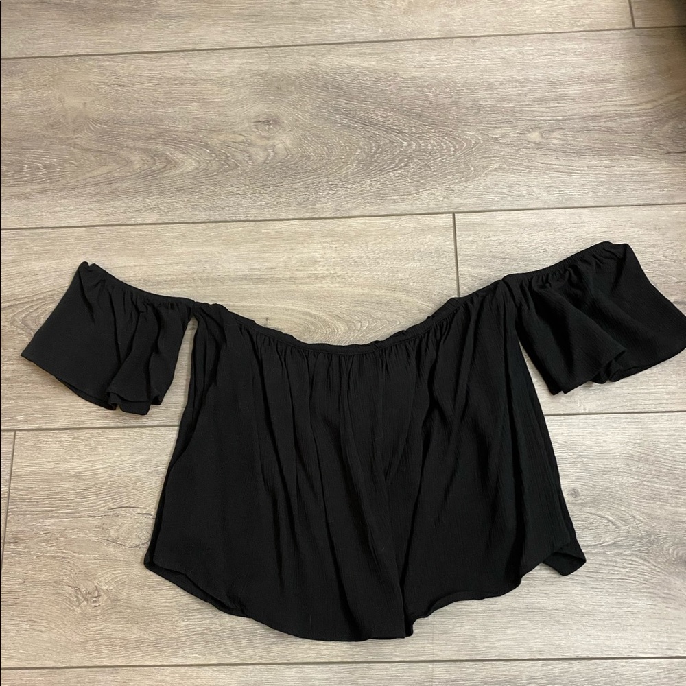 Completely open back off the shoulder top. Tie back